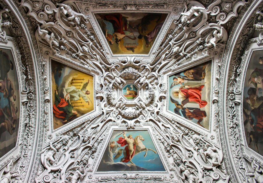 Detailed view of the ornate ceiling frescoes in Salzburg Cathedral, Austria.