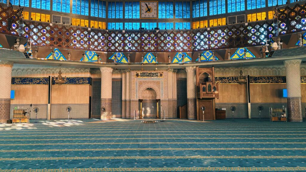Stunning view of the interior showcasing intricate designs and vibrant colors in a Kuala Lumpur mosque.